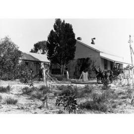 Horse and Cart in Front of House