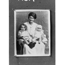 Portrait of unidentified woman with two children