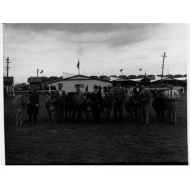 Men standing with their bulls - Royal Adelaide Show