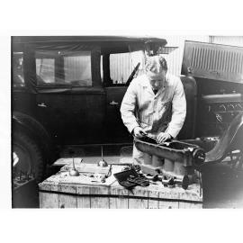 Students using trade school equipment