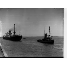 Steamship Delphic of London Being Pulled by Tugboat Woonda