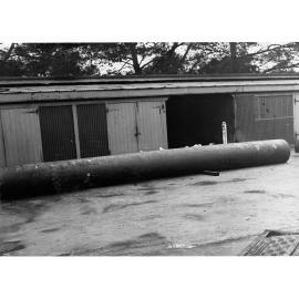 Steel Water Pipe in Front of Shed