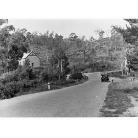 Automobile on road by Anglican Mission Hall at Stony Creek near Forest Range