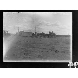 View of men, horses and wagon, East-West railway line