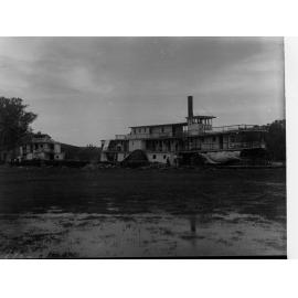 Two paddle steamers on a bank of River Murray