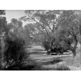 Man in automobile at Mooney Creek