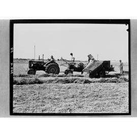 Man on tractor ploughing field