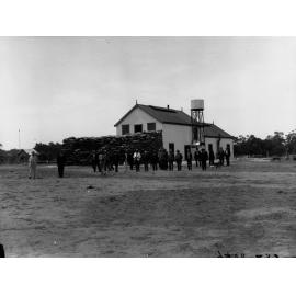 Berri pumping station, showing men outside