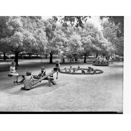 Children at Play in South Terrace Park on See Saw and in Sand Pit