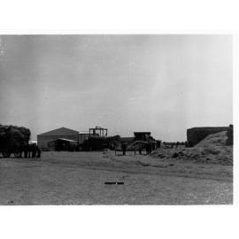 Hay stacks - showing men working and horse and wagons