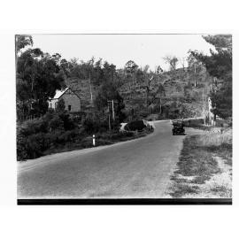 Automobile on road by Anglican Mission Hall at Stony Creek near Forest Range