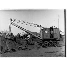 Sewers Department, Glenelg, showing backhoe excavation