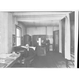 Lands Department Photolithographic Printing Room - shows two men, camera and glass negative plate container