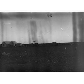 Parliamentary party on tour of Far North in Austin cars (government cars) - shows farmhouse and windmill in distance