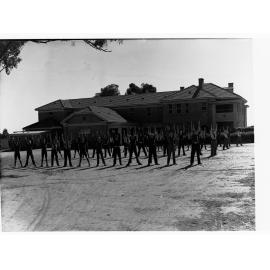 Urrbrae Agricultural College showing students exercising on oval