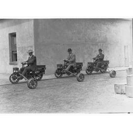 Three men riding Railway Motor Tricycle - South Australian Railway negatives