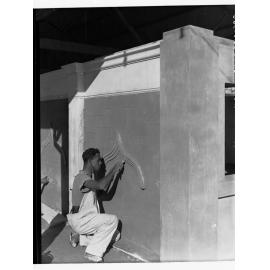 Trainee Plasterer at Work