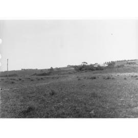 Rural view of Happy Valley - farmhouses in distance