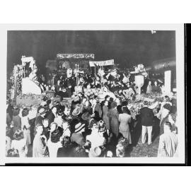 People at festival (banner reads Truro Wine Dots)