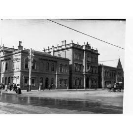 Government offices showing chief secretary and treasury offices on Flinders Street (taken from Victorica Square also showing church in background)