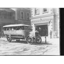 Charabanc outside the Intelligence and Tourist Bureau