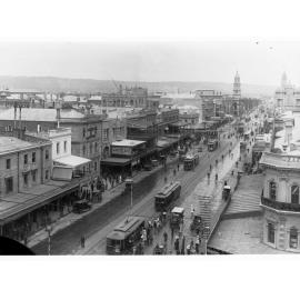 King William Street looking south showing trams and the town hall in distance
