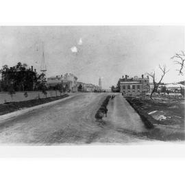 Looking south along King William Street, acoss North Terrace intersection (Gresham Hotel on right, Town Hall in background on left)