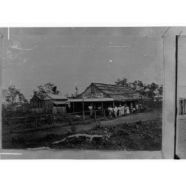 The Commercial Hotel, Palmerston, Northern Territory - early settlers standing outside on the verandah