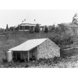 Momomeith', Marble Hill Road, Ashton, showing house and stone hut
