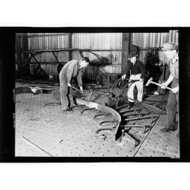 Whyalla - three men using industrial equipment