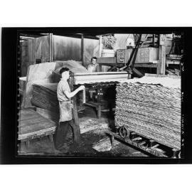 S.A. Plywoods - employees using equipment