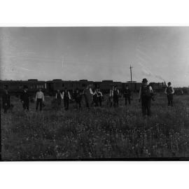 Parliamentary Visit - picking wildflowers (Narrow Gauge Rail Line - Possibly the Ghan)