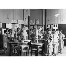 Students at art school doing sculpture