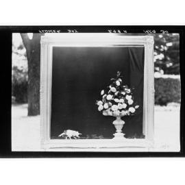Flower Day - exhibit of vase and flowers surrounded by picture frame