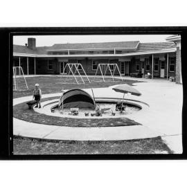 Child Welfare Department,  children playing in sandpit