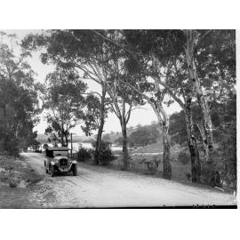 Automobile on a Road Near Williamstown Millbrook Reservoir in Background