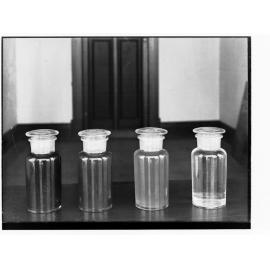 Four glass jars on a ledge