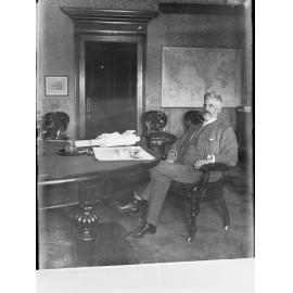Portrait of Thomas Price in an office