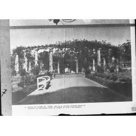 Building Covered by Ivy and Surrounding Garden