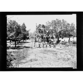 Child Welfare Department - children on playground equipment