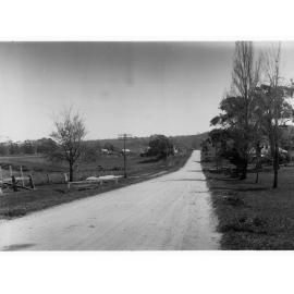 Country Town Showing Dirt Road and Farm Houses