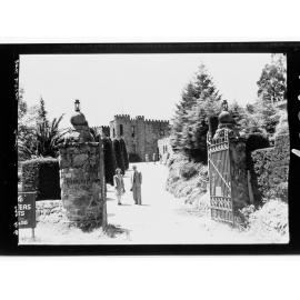 Visitors at entrance to the tea rooms, 'The Castle', Basket Range