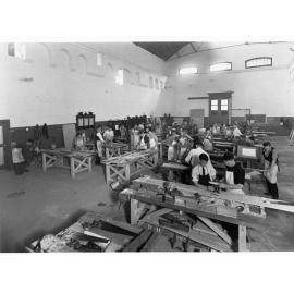 Education Department Trade School showing students doing woodwork