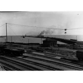 New jetty, Wallaroo, showing railway tracks and a ship berthed