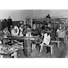 Education Department Trade School showing students making furniture