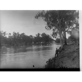 Man standing on the bank of River Murray