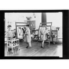 Children's Welfare Department - children painting in playroom
