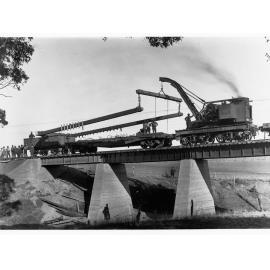 Railway Bridge over Pine Creek showing men working