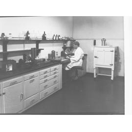 Engineering and water supply, showing man working in laboratory - Glenelg Sewerage Treatment Works