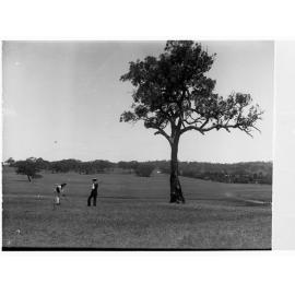 Men on golf links at Clare